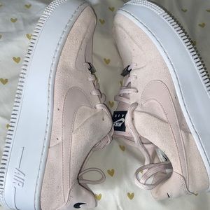 Baby pink suede Nike Air Force ones